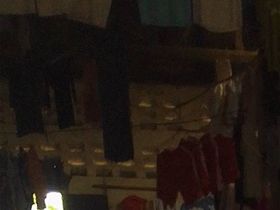 Marie is in the market called Zairwa, where she's marketing and selling her tailoring products.
